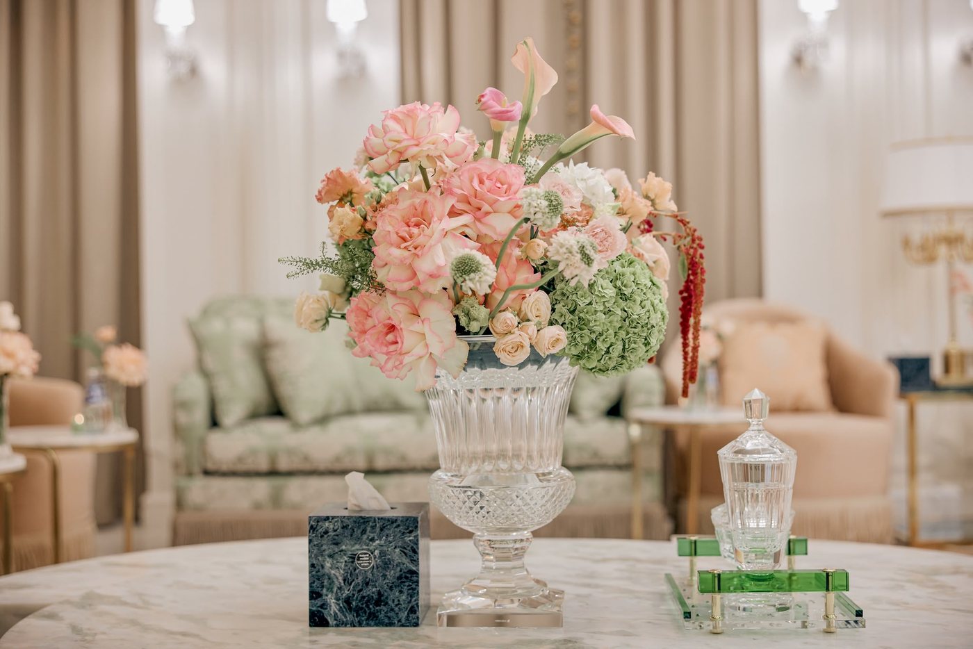 Small real project floral arrangement on marble table used as a decor accent